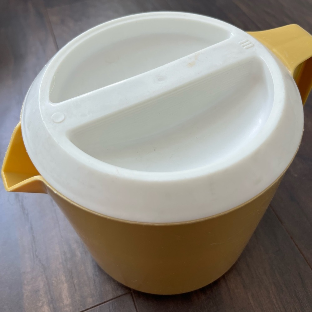 Vintage plastic pitcher with lid